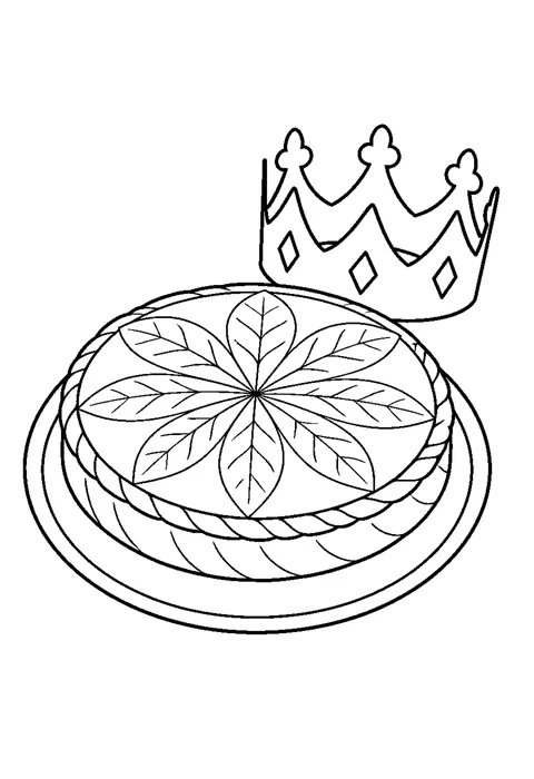 A round galette des rois on a plate beside a paper crown.